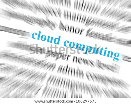 The text cloud computing in blue and in focus. Surrounding text blurred with zoom effect.