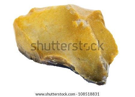 An ancient stone tool with brownish patina on parts of the surface.