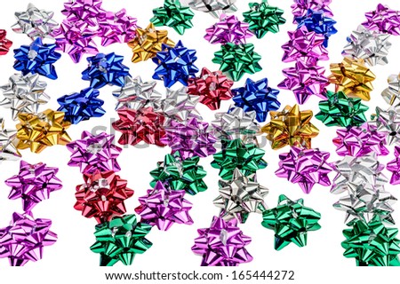 Several blue, red, white, yellow and pink metallic bows.