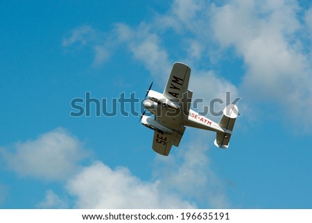 KALLINGE, SWEDEN - JUNE 01, 2014: Swedish Air Force air show 2014 at F 17 Wing. Miles Gemini twin engine touring aircraft, airborne.
