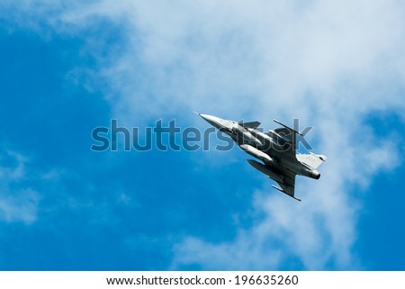 KALLINGE, SWEDEN - JUNE 01, 2014: Swedish Air Force air show 2014 at F 17 Wing. SAAB JAS 39 Gripen in the air.
