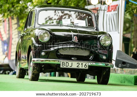 RONNEBY, SWEDEN - JUNE 28, 2014: Nostalgia Festival with classic cars and motorcycles as main attractions. Black Standard 8 classic car.
