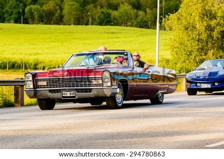 RONNEBY, SWEDEN - JUNE 26, 2015: Veteran car street cruise on public roads. Cadillac deville from 1967.
