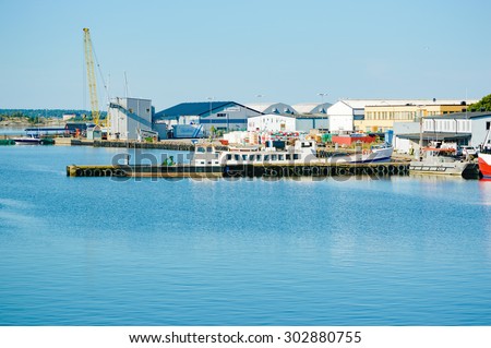 KARLSKRONA, SWEDEN - AUGUST 03, 2015: Fishing industry is no longer as intense as it used to be. This harbor used to be full of fishing vessels and fishing industries. This is Salto fishing harbor.
