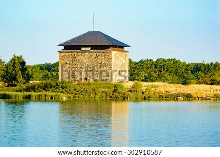 Old wartime storage building. These buildings are located far from houses, often on islands, and were used to store gunpowder and other wartime necessities. Morning sun gives a warm feeling.
