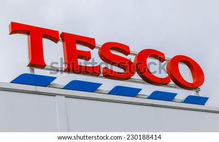 MACCLESFIELD,UK - NOVEMBER 12 2014: Tesco supermarket sign with logo.  Retail food prices are falling with all supermarkets including Tesco cutting their prices.