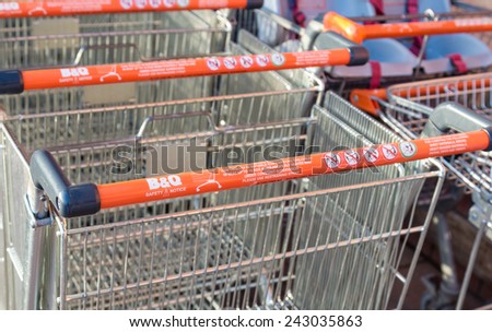Manchester, UK - January 5th 2015: B&Q Shopping trolleys or carts with health and safety instructions. One of the largest UK DIY retailers, the health and safety of its customers is a key concern.