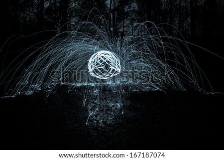 lightpainting in forest, painting, light, fire and sparks
