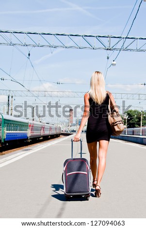 young and beautiful woman on the platform