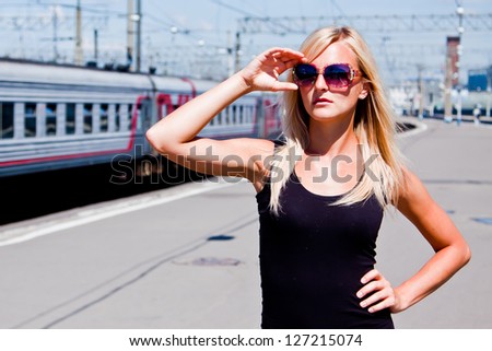 young and beautiful woman on the platform