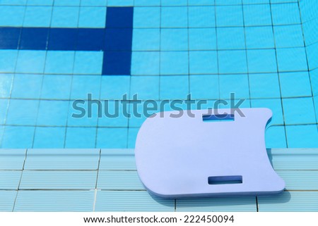 Blue foam board in a pool