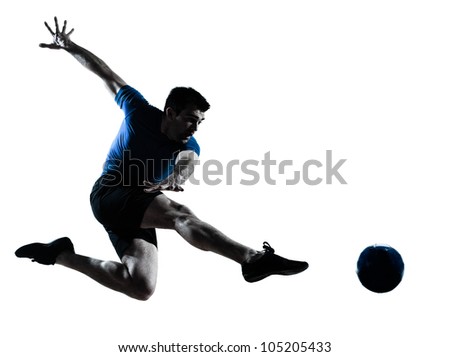 one caucasian man flying kicking playing soccer football player silhouette in studio isolated on white background one caucasian man flying kicking playing soccer football player silhouette in studio isolated on white background