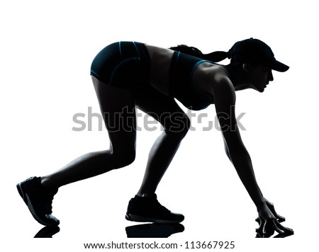 one caucasian woman runner jogger  on the starting block in silhouette studio isolated on white background