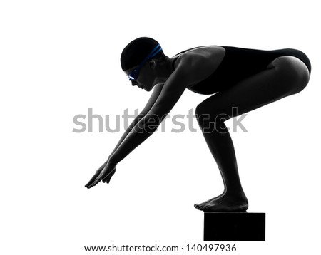 one caucasian woman competition swimmer on starting in silhouette studio isolated on white background