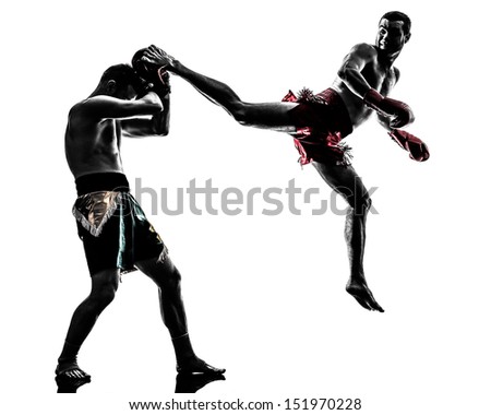 two caucasian men exercising thai boxing in silhouette studio on white background two caucasian men exercising thai boxing in silhouette studio on white background