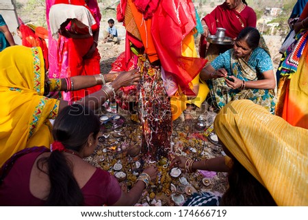 RAJASTHAN, INDIA - MARCH 21, 2009: woman of the countryside are celebrating the god who protect them in the Gangaur festival one of the most important of the year