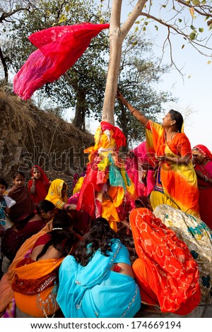 RAJASTHAN, INDIA - MARCH 30, 2009: people celebrating the god who protect them in the Gangaur festival one of the most important of the year