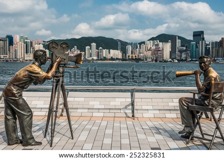 Kowloon , Hong Kong, China- June 9, 2014: statues Avenue of Stars Tsim Sha Tsui Kowloon in Hong Kong