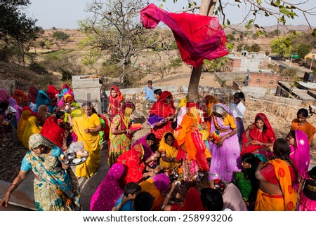 Jaipur, India - March 21, 2009 : woman of the countryside are celebrating the god who protect them in the gangaur festival one of the most important of the year,march 21 2009 in all rajasthan,india