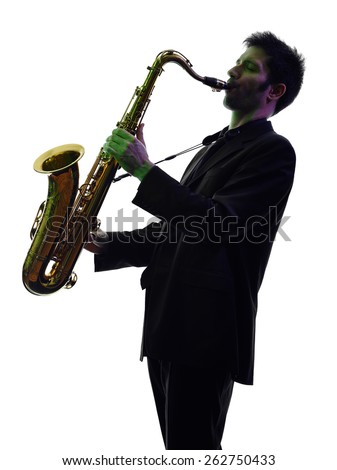 one caucasian man  saxophonist playing saxophone player in studio silhouette isolated on white background