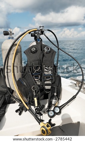 scuba diving equipment on a boat on a sea