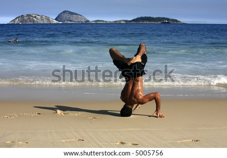 stock photo carioca doing capoeira on ipanema beach in rio de janeiro 