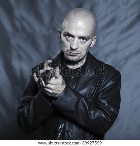 portrait studio on isolated background of a strange man with his rat