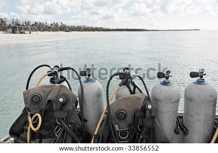 scuba diving equipment on a boat on a se