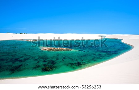 http://image.shutterstock.com/display_pic_with_logo/77880/77880,1274050278,1/stock-photo-view-of-lagoa-azul-in-desert-white-sand-dunes-of-the-lencois-maranheses-national-park-in-brazil-53256253.jpg
