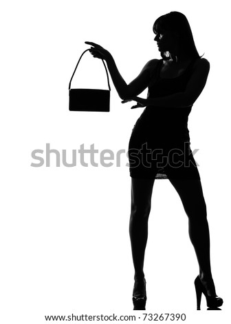 stylish silhouette caucasian beautiful woman holding purse full length on studio isolated white background