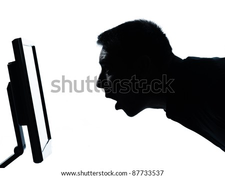 one caucasian business man face silhouette with computer screen display surprised portrait in studio isolated on white background