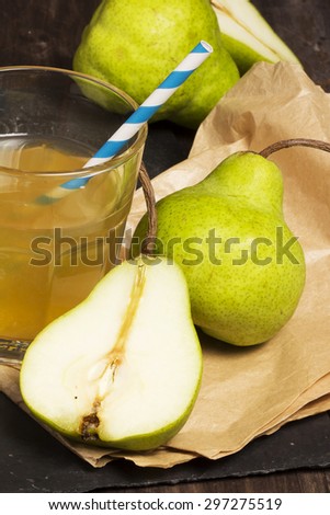 Pear Juice with fresh fruits on vintage background