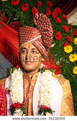 stock photo A portrait of an Indian groom in a traditional wedding attire