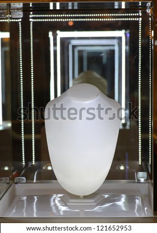 Empty white jewelry showcase