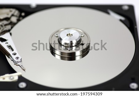 Harddisk drive (HDD) with top cover open isolated on white background