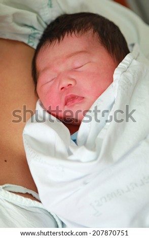 newborn baby Aged 2 Days sleep in the blanket