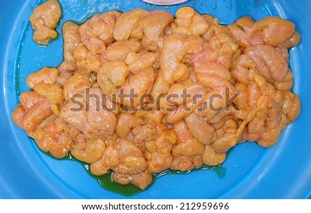 small fish roe in plastic plate