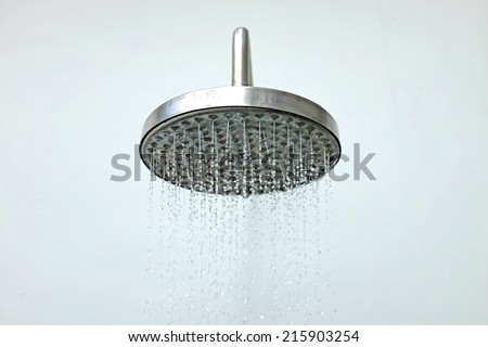 close up on head shower while running water