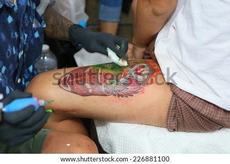 BANGKOK, THAILAND - OCTOBER 23: Unidentified contestant\'s tattoo at MBK Center \