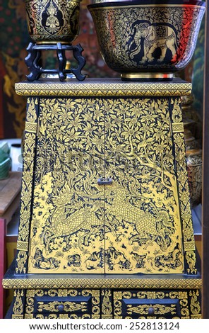 BANGKOK, THAILNAD - FEBRUARY 14: Thai style hand craft box cabinet on sale at Central World Plaza during the Chinese New Year celebrations on February 14, 2015 in Bangkok, Thailand