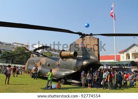 BANGKOK - JANUARY 14 :Children’s day, Royal Thai Army weapons of various types at the Thai Army Headquarters, military helicopter on January 14, 2012 in Bangkok Thailand.