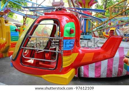 Toy Helicopter carousel in empty amusement park