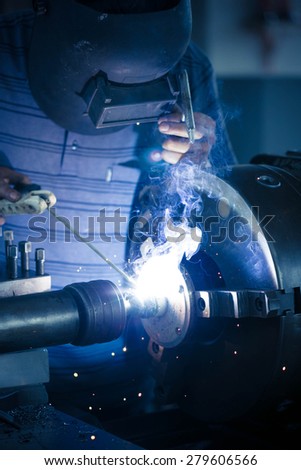 Industrial welder welding