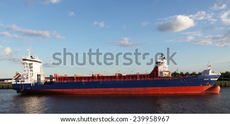HAMBURG, GERMANY - JUNE 25, 2014: Transport ship Elan on the river Elbe in the harbor of Hamburg.  Hamburg has the most important international harbor of Germany