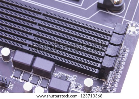 closeup of random access memory slots on a computer motherboard