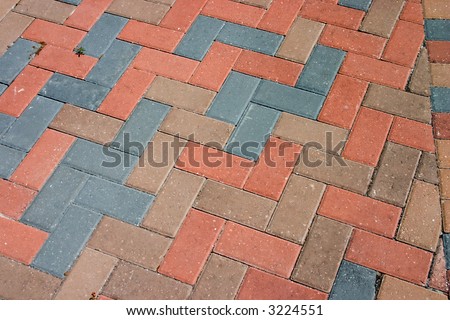 diagonal pattern of brick pavers in a Herringbone style