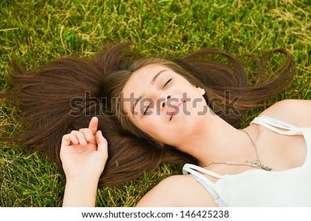 Healthy and happy woman enjoying her vacation in the park