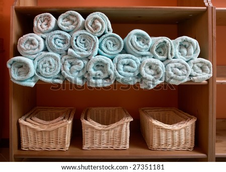 Rack with Rolled Up Towel and basket