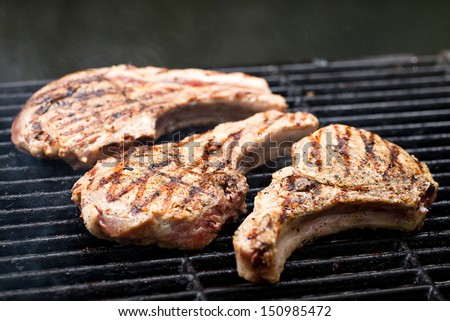 Pork chops on grill