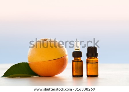 Grapefruit essential oils in bottles